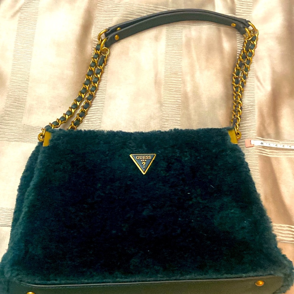Furry, dark green Guess bag.